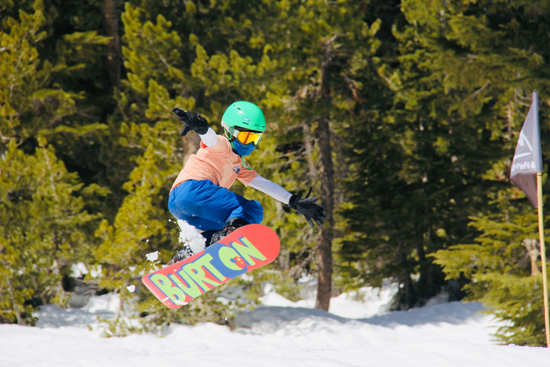 Kid snowboard jump